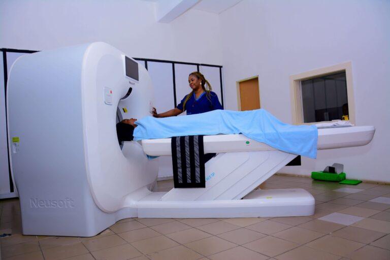 Specialists of St Luke's Hospital, Asaba, Delta, Nigeria attending to patient via a medical machine